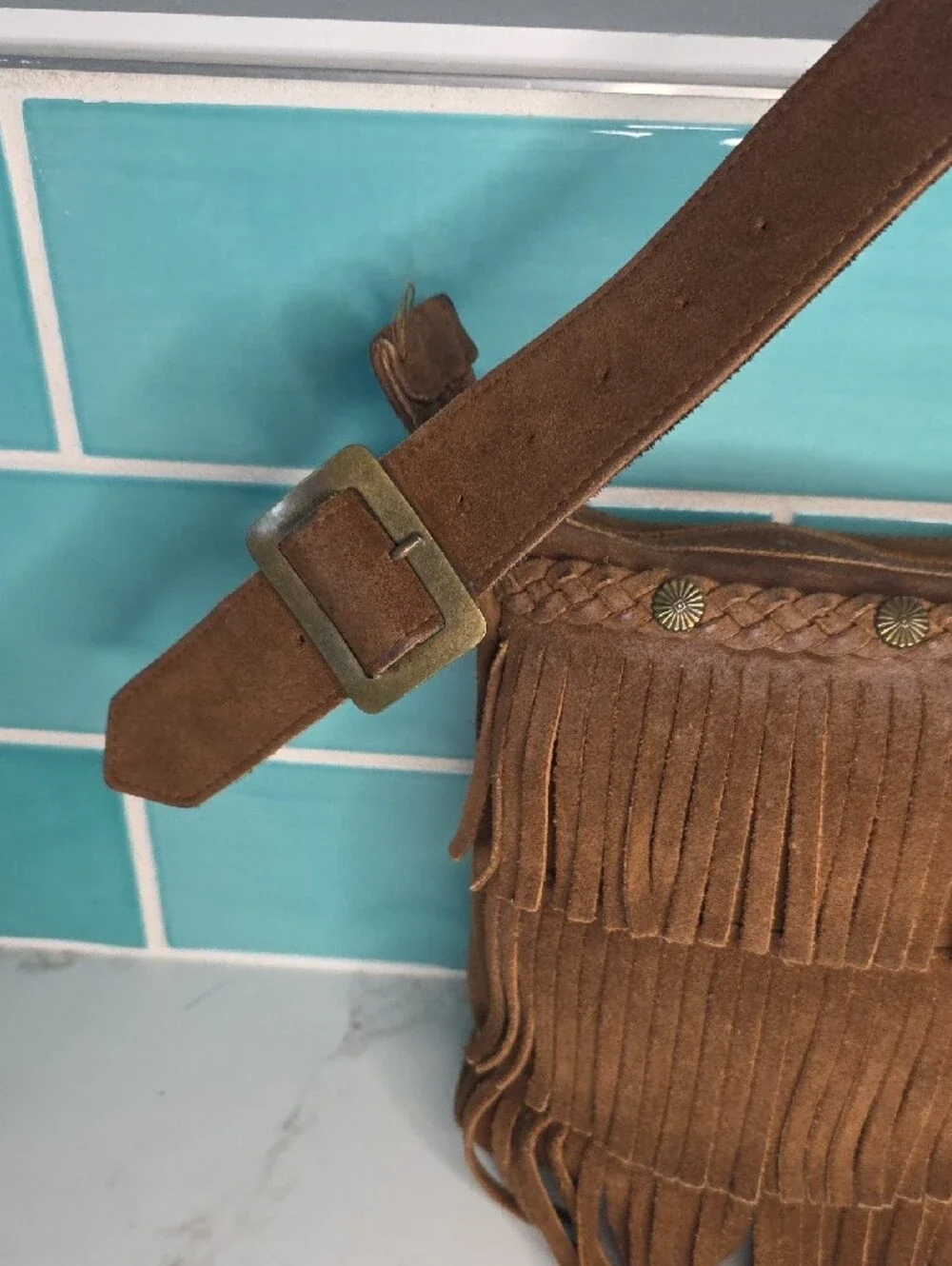 Minnetonka Fringed Suede Crossbody Bag in Brown